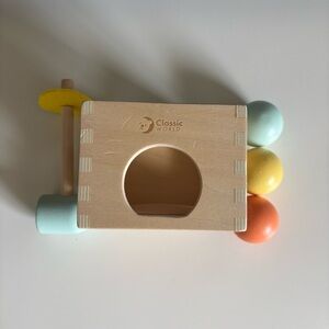 Wooden Push-Through Learning Toy in Pastel Blue, Yellow, Orange